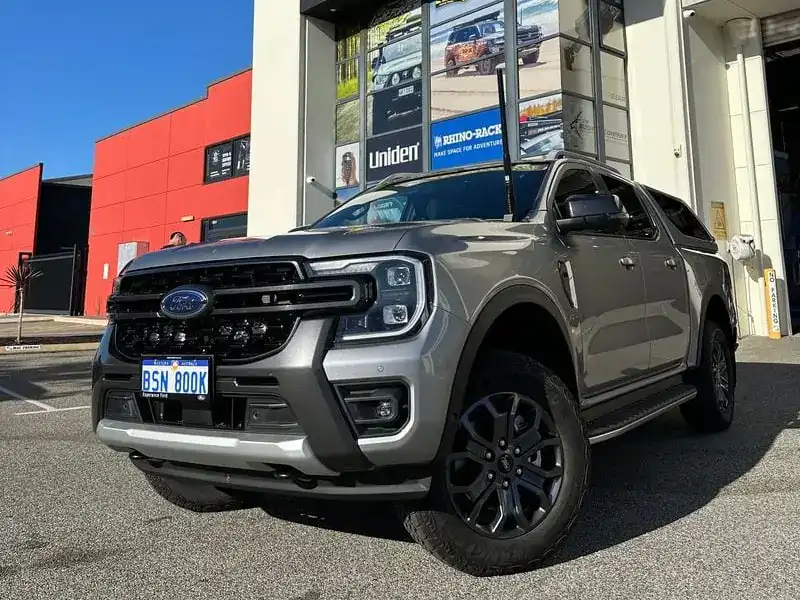 Silver Next Gen Ford Ranger fit-out with canopy outside the M4C store in Canning Vale