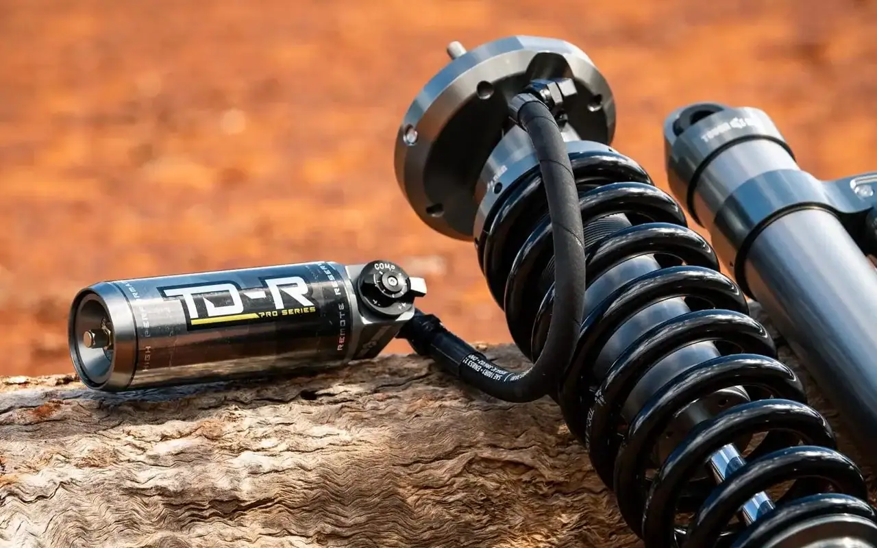 Tough Dog TD-R Pro Series remote-reservoir shock absorber and coil on red dirt